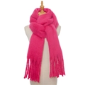 Close-up of soft pink mohair scarf showing thick knit texture and fringe tassel detail - Rose Red