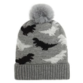 Detail of baby dinosaur knit beanie featuring gray yarn texture and fluffy pompom top - Gray