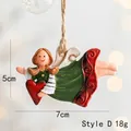 Detail of resin angel ornament with red heart and twine rope for Christmas tree - Style D Green Dress Flying with Heart