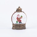 Vintage bronzen kerstlantaarn met kerstmanfiguur en glinsterende sneeuwvlokken - Zittende Kerstman Sneeuwbol / Brons
