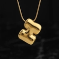 Golden H-shaped bubble letter pendant on a fine chain over dark marble background - Gold (H) (Large)