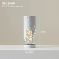 White Christmas glass tree decoration with star cutouts and warm light, 8x8x20cm size - MZ-23168M Large White