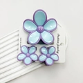 Three-piece plumeria hair claw set in light blue with purple edges on jewelry card - Purple-edged Sky Blue Set (including Card)