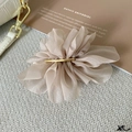 Detail of elegant champagne chiffon flower hair clip with golden metal hardware - Gentle Milk Tea