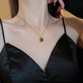 Vintage gold rope chain necklace with an oval tiger eye stone pendant on a model - 40# Necklace-Gold