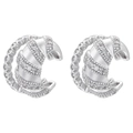 Detalle de pendientes de clip en espiral color plata con incrustaciones de circonitas - Oro Blanco