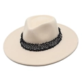 Détail d'un chapeau fedora beige avec un ruban en tweed noir et blanc chic et des franges - M (56-58cm) / Poche zippée