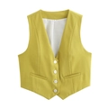 Détail d'un gilet de costume jaune moutarde à col en V avec quatre boutons et poches déco - Curcuma