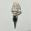 Seashell wine bottle stopper with natural shell top and polished metal base - Rough Phoenix Conch Stopper