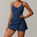 Dark blue tennis dress with V-neck, twist front skirt, and built-in shorts for women - S / Twilight Blue