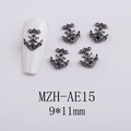 Macro view of gunmetal gothic skull anchor nail charms for dark aesthetic manicures - Skull Anchor (AE15)