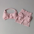 Sakura pink seamless yoga set with halter sports bra and high-waisted scrunch butt shorts - S / Soft Pink