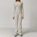 Set yoga beige due pezzi con giacca corta con zip e pantaloni svasati sportivi - Taglia S / Top E Pantaloni / Albicocca grigio