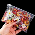 Elastic colorful hair ties for girls in a clear pouch with small daisy prints - Neon Color Plush 100pcs