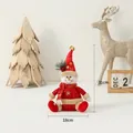 Plush Christmas snowman doll with red snowflake hat and scarf, size 31cm height - Sitting Snowman