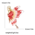 Broche papillon élégante en émail rouge et jaune avec strass et dimensions détaillées - Rose