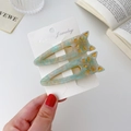 Two-piece marble teal cat hair clips with golden accents and metal duckbill clips - Light Green Texture