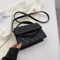 Fashionable black quilted shoulder bag with chunky chain detail and thin strap - Black