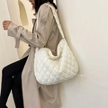 Quilted white shoulder bag for women with padded puffer design and minimalist aesthetic - White