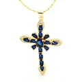Detail of gold cross pendant with blue pear-cut gemstones and sparkling white crystals - Blue