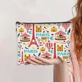 Detail of Paris theme canvas pouch held by hand featuring Eiffel Tower and monuments - Paris Landmarks Illustration Style (jiayingpbb0258)