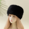 Elegant black faux fur winter hat for women presented on a realistic studio mannequin - M / Black