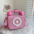 Pink telephone-shaped crossbody bag with retro dial and heart detail on lace tablecloth - Small / 20x16x10cm / Pink