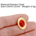 18K gold plated stainless steel pendant with red oval stone on a fingertip - DY795-1 Beaded Edge Red Stone