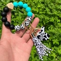 Silicone bead keychain bracelet with leopard print Mama tag and cow print tassel - Turquoise/Cow Print
