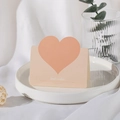 Pink heart-shaped cutout greeting card with Best Wishes text on a ceramic plate - Cream Orange