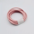 Close-up of 6mm pink PU leather cord with side stitching for DIY handbag straps - Pink