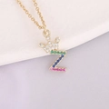 Macro shot of 18K gold plated crown letter Z necklace with multicolor zircon stones - Letter Z Style