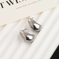 Minimalist silver bean-shaped stud earrings in highly polished titanium steel finish - Hollow Waterdrop Earrings / Silver
