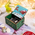 Green wooden hand-cranked music box with Merry Christmas santa claus engraving - Christmas 6/Green/Merry Christmas Illustration