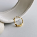 Macro shot of 18K gold plated S925 sterling silver ring with organic wavy design - Adjustable Open / Gold Twisted Line Ring