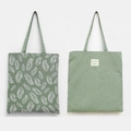 Double-sided forest green canvas tote bag with leaf pattern and LIFE WITH LEAVES patch - Green Base Small Leaf