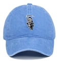 Close-up of the detailed Grim Reaper embroidery on a light blue washed cotton baseball cap - One Size / Light Blue