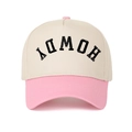 Close-up of HOWDY letter embroidery on two-tone beige and pink cotton baseball cap - Beige/Pink