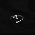 Polished silver adjustable ring featuring a pavé zircon letter I and a single round diamond - Letter I