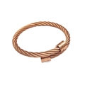 Macro shot of rose gold braided titanium steel cable bracelet with cylindrical end caps - Rose Gold