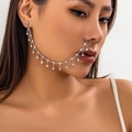 Ethnic nose-to-ear chain with silver tassels and white rhinestones on female model - Silver