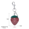 Sparkly red strawberry keychain with green leaves and silver ring in variant view - K00892-02 Glitter Red Strawberry Keychain (Silver)