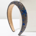 Detail of padded star headband featuring gray rhinestones and blue crystal accents - Bright Black