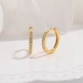 Macro detail of gold S925 sterling silver hoop earrings with cubic zirconia inlay stones - 16mm / Gold