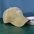Detail of washed khaki green baseball cap featuring a minimalist white heart embroidery - One Size (57-59cm) / Khaki
