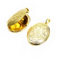 Detailed view of an open and closed gold-plated oval locket with intricate floral engravings - Oval Style 4