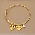 Adjustable golden MOM bracelet with heart charms, pearl detail, and mother-child silhouette - Heart Pearl Mother-Child Style (KB203629-Z)