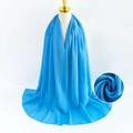 Elegant blue pearl chiffon shawl wrap with lightweight drape and detailed fabric texture - Blue