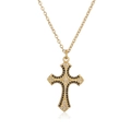 Macro shot of 18K gold plated cross pendant featuring black and clear zircon stones - Black And White Rhinestone Cross Style (2054YH)