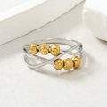 Bague anti-stress en acier inoxydable avec 6 perles dorées et design ajouré élégant - Taille unique / Motif en croissant